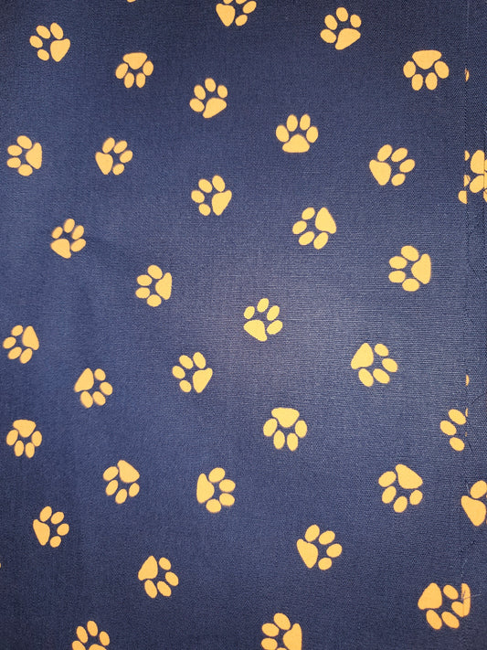 Orange Paw Prints on Navy Cotton Fabric