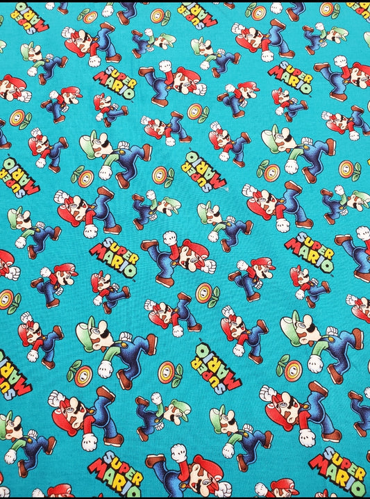 Super Mario Bros Running on Teal Blue Cotton Fabric
