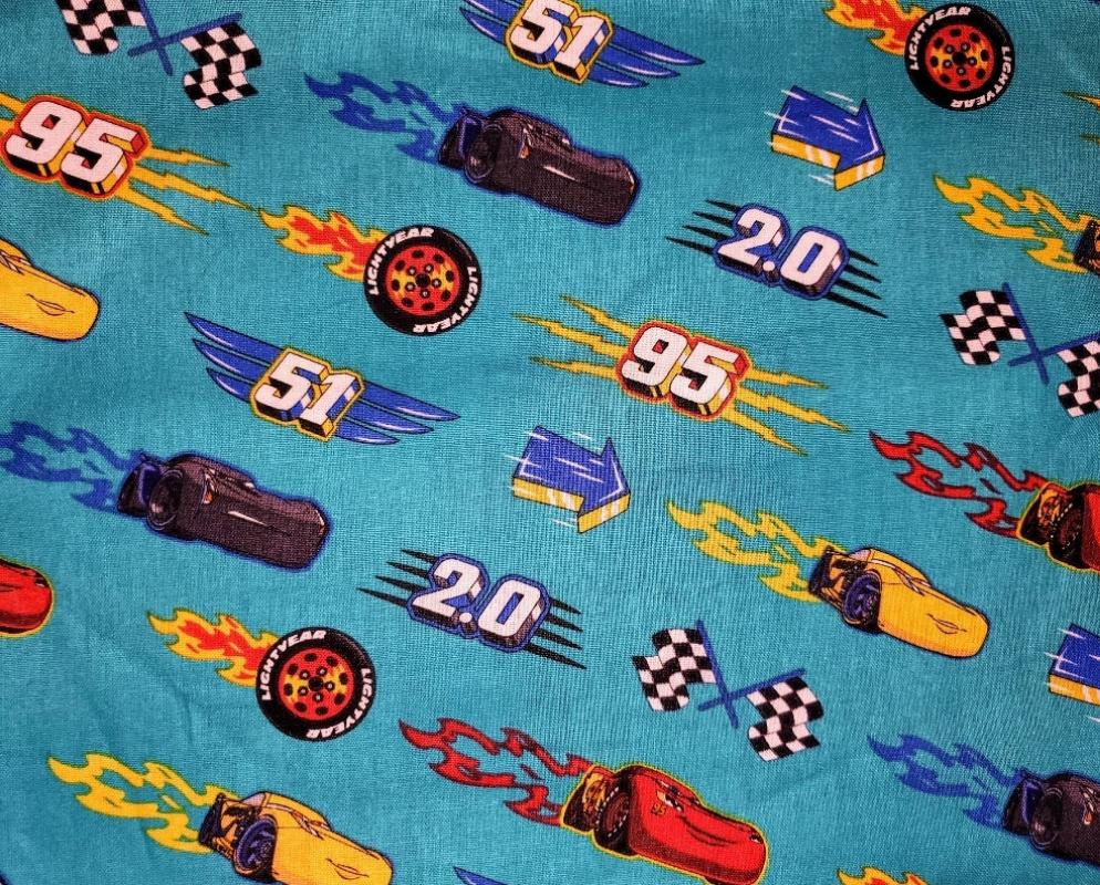 Disney Cars Racing on Teal Cotton Fabric